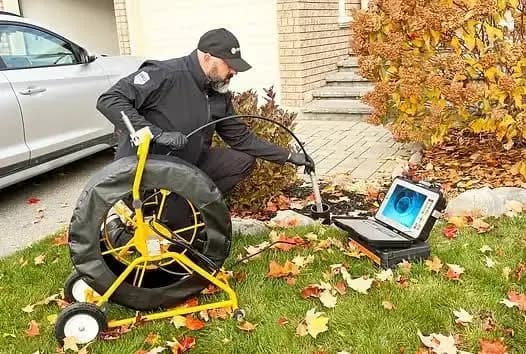 Plumber performing a sewer camera inspection in Tupelo, MS